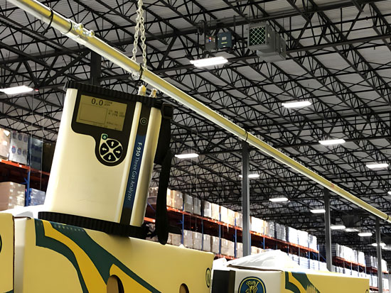 warehouse with ethylene monitor and ethylene scrubber in the background